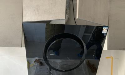 如何正确清洗名气油烟机（清洗名气油烟机的正确方法和技巧）